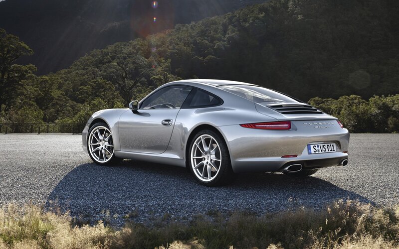 Silver Porsche 911 parked outdoors