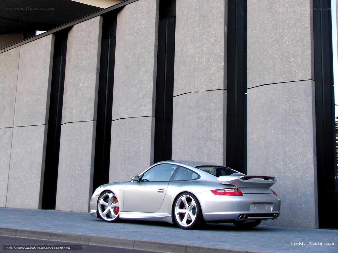 Silver Porsche 911 parked outside