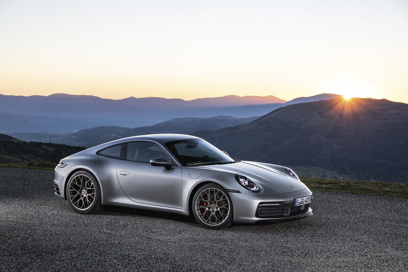 Silver Porsche 911 — Serene, Sunset