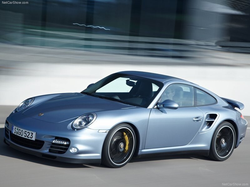 silver porsche 911 turbo in motion