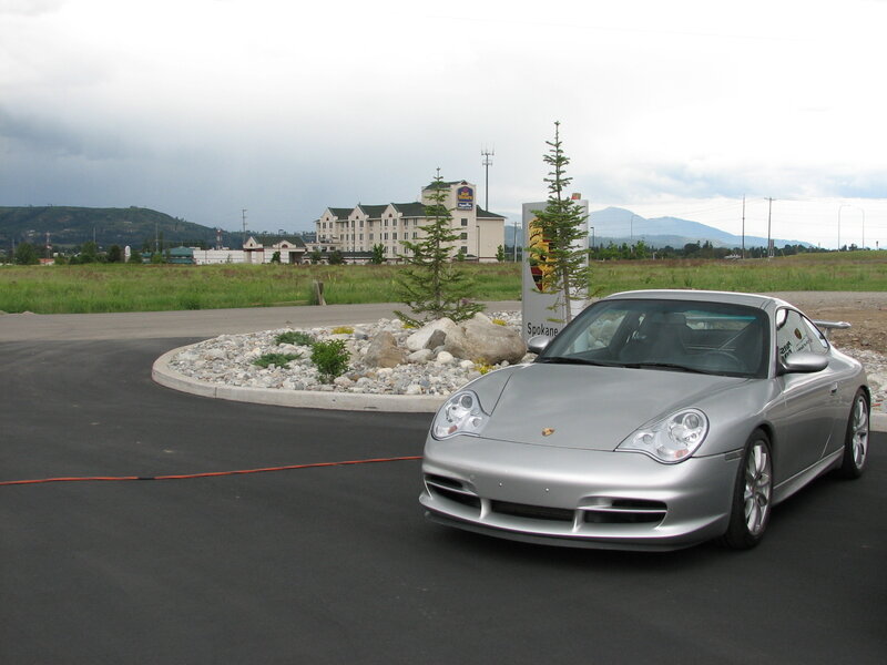 Silver Porsche at dealership