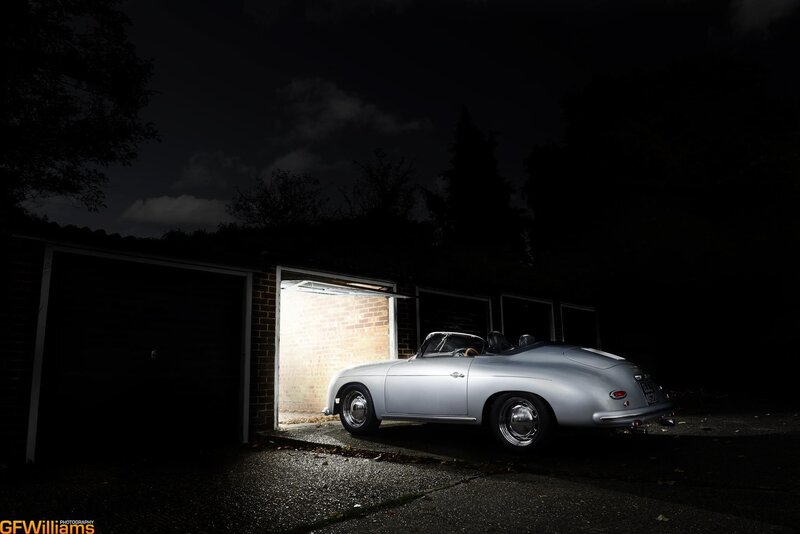Silver Porsche at night