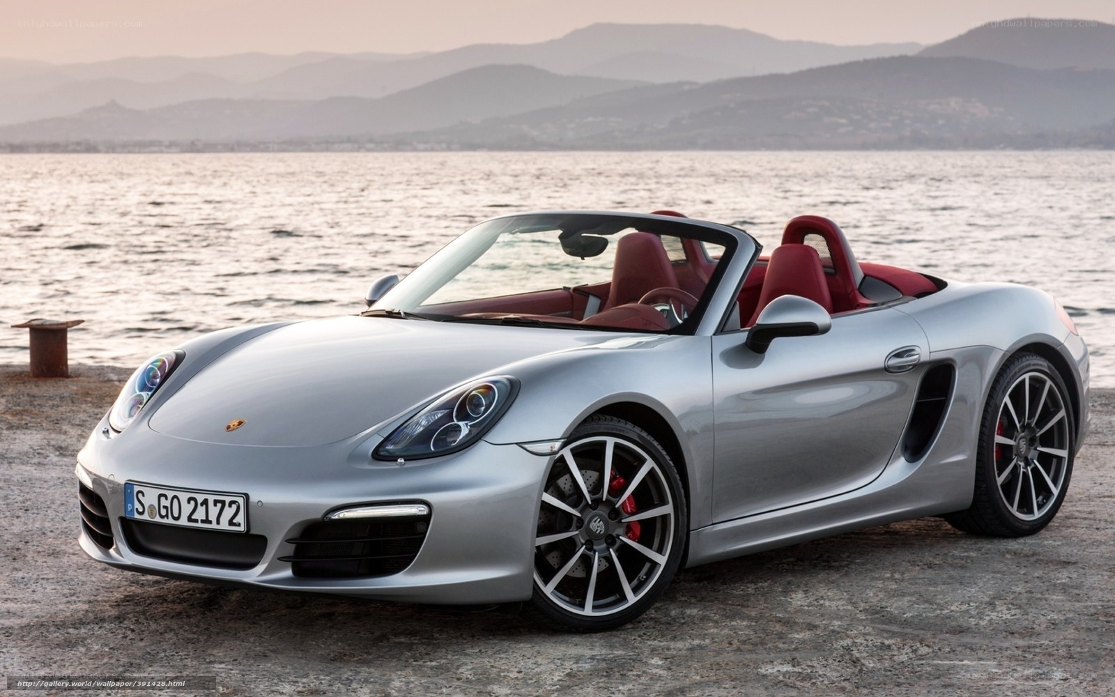 Silver Porsche Boxster by the sea