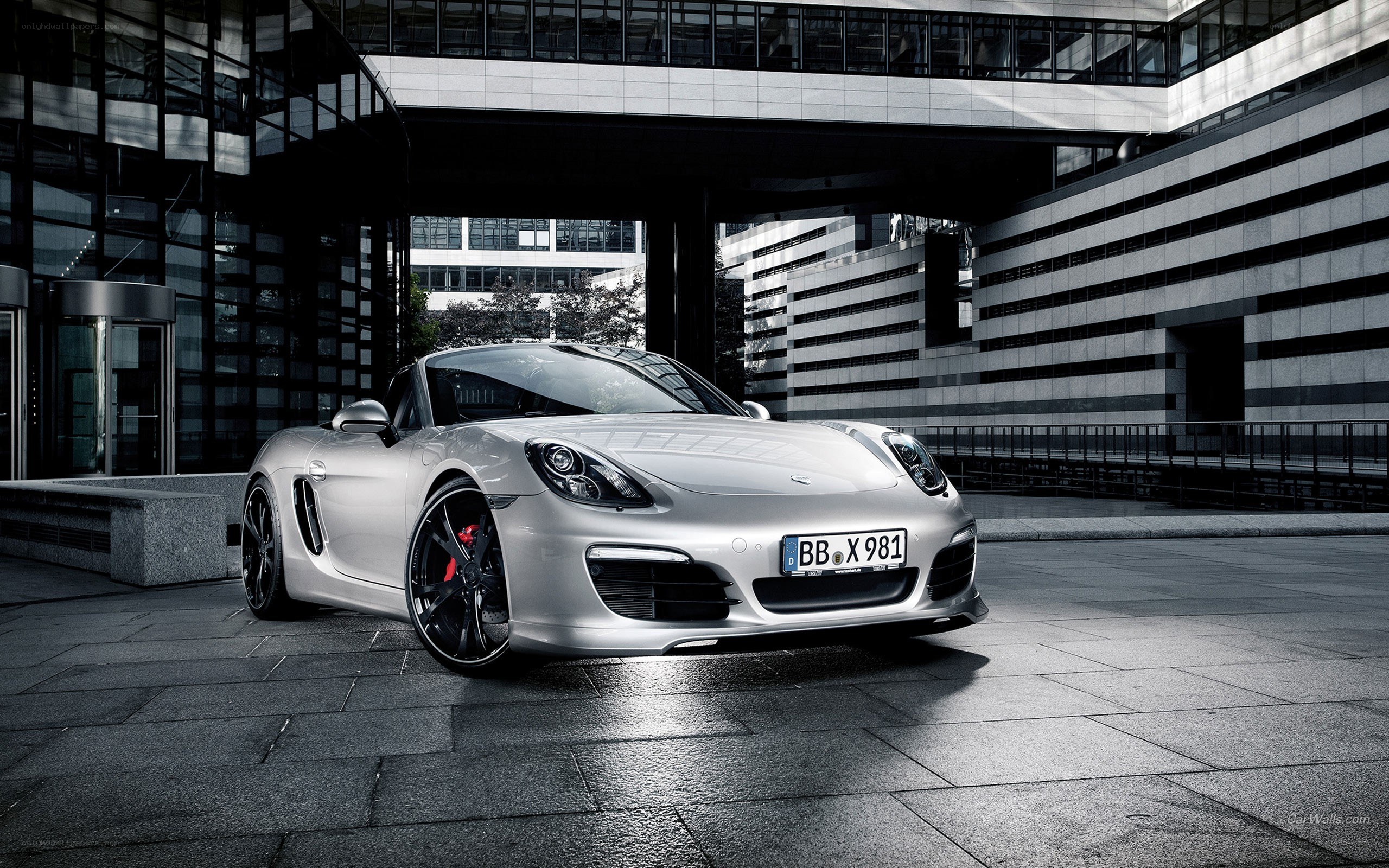 Silver Porsche Boxster in urban setting