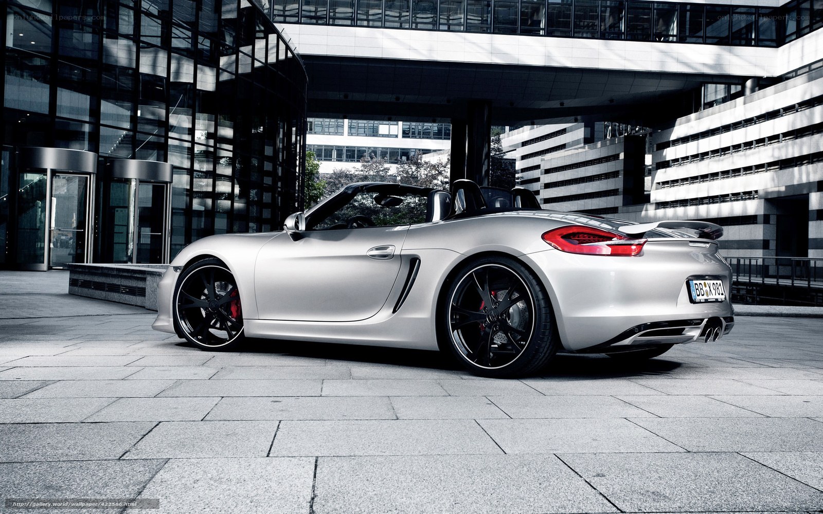 Silver Porsche Boxster parked
