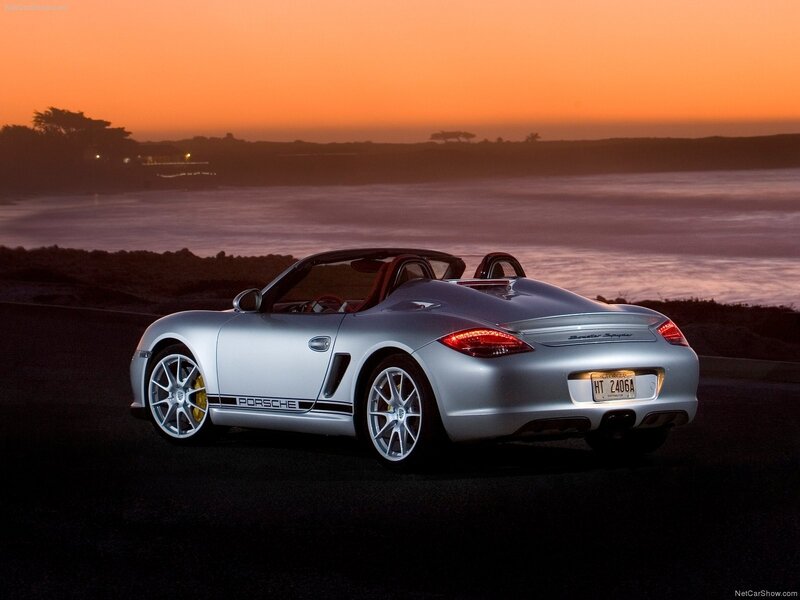 Silver Porsche Boxster Spyder at sunset