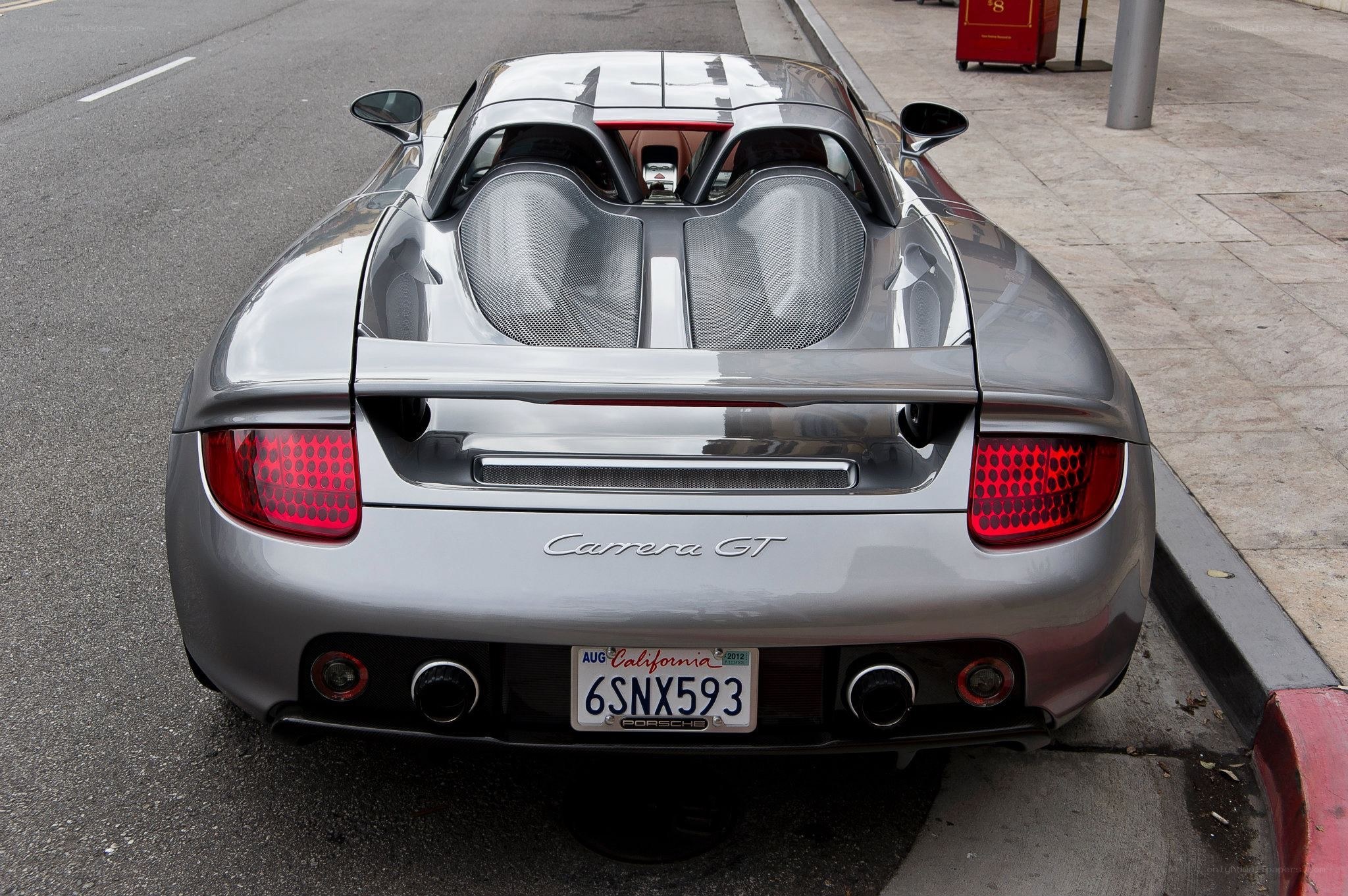 silver porsche carrera gt