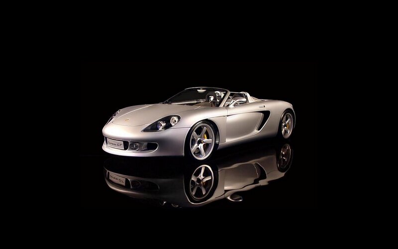 silver porsche carrera gt