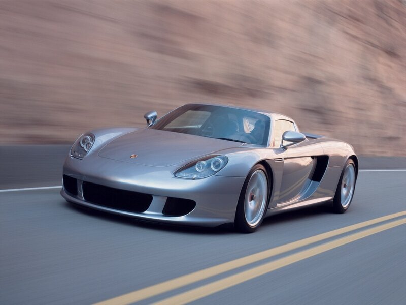 Silver Porsche Carrera GT in motion
