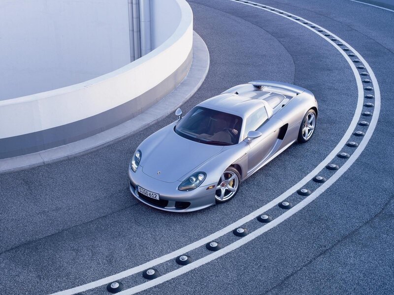 Silver Porsche Carrera GT on track