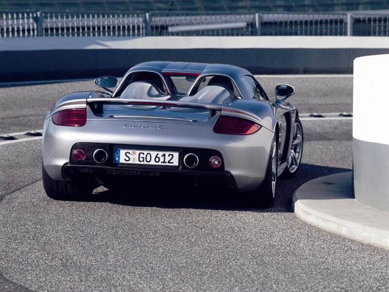 Silver Porsche Carrera GT on track
