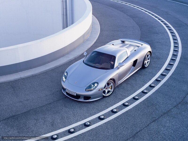 Silver Porsche Carrera GT on track