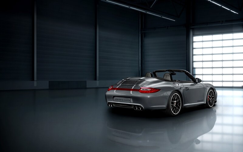 Silver Porsche Carrera GTS convertible