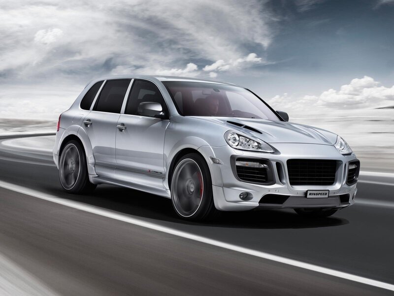 silver porsche cayenne in motion