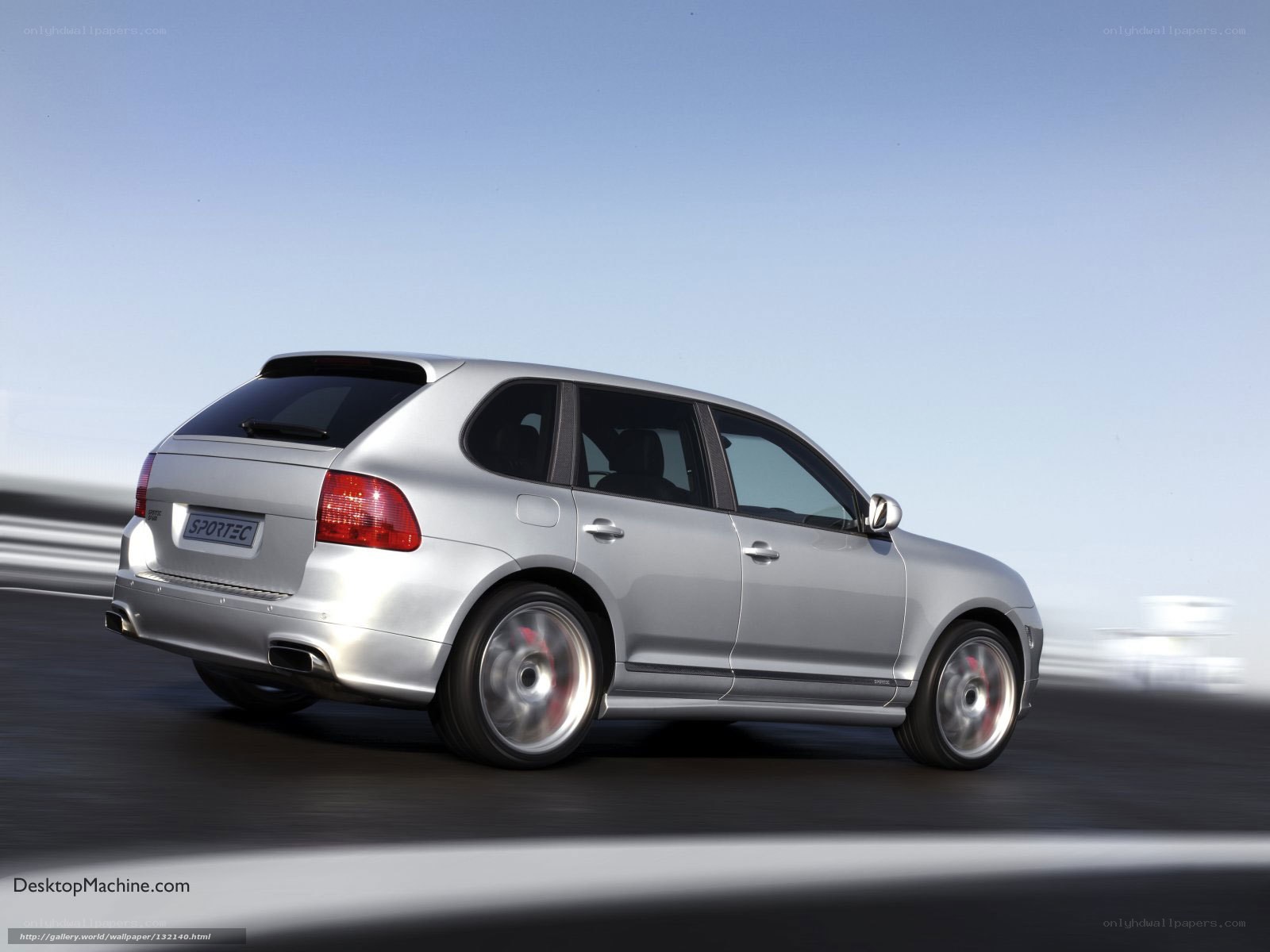 silver porsche cayenne in motion