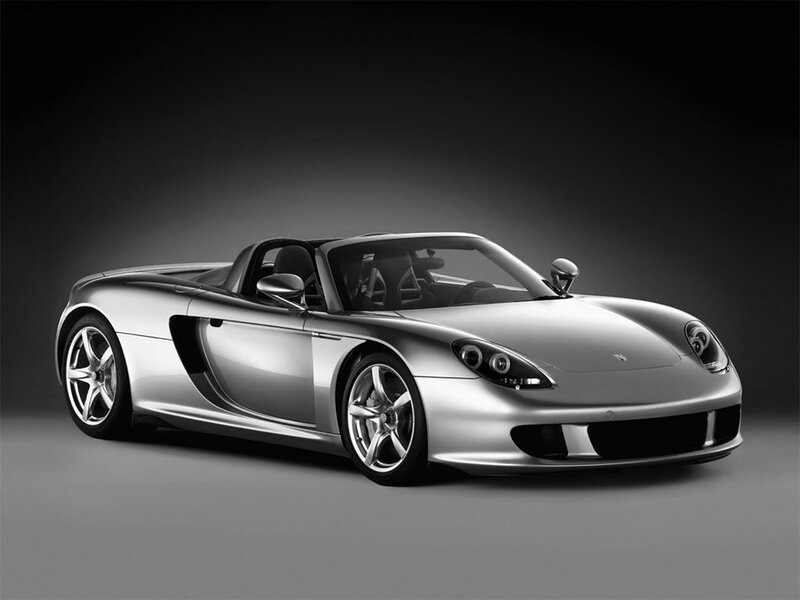 silver porsche cayman sports car