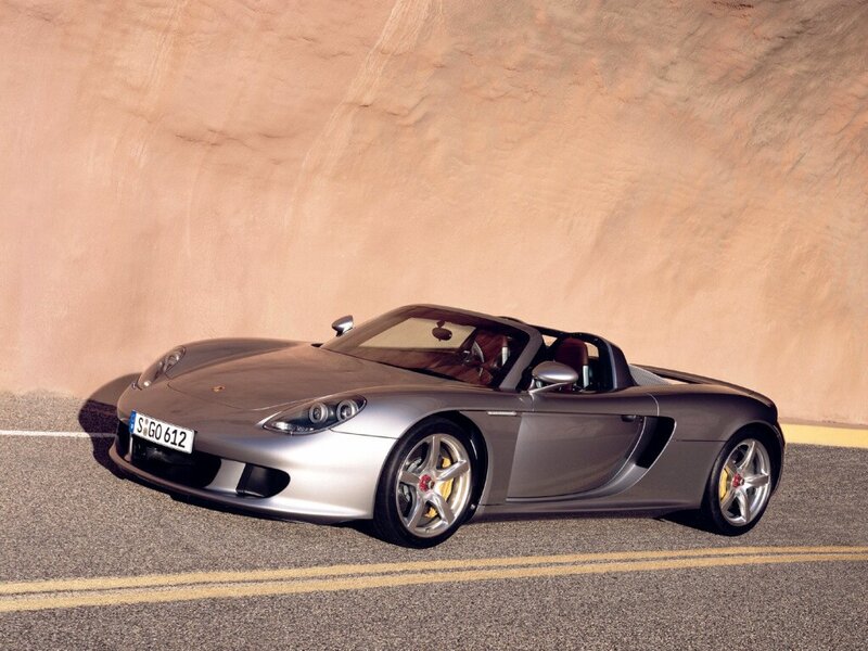silver porsche cayman sports car