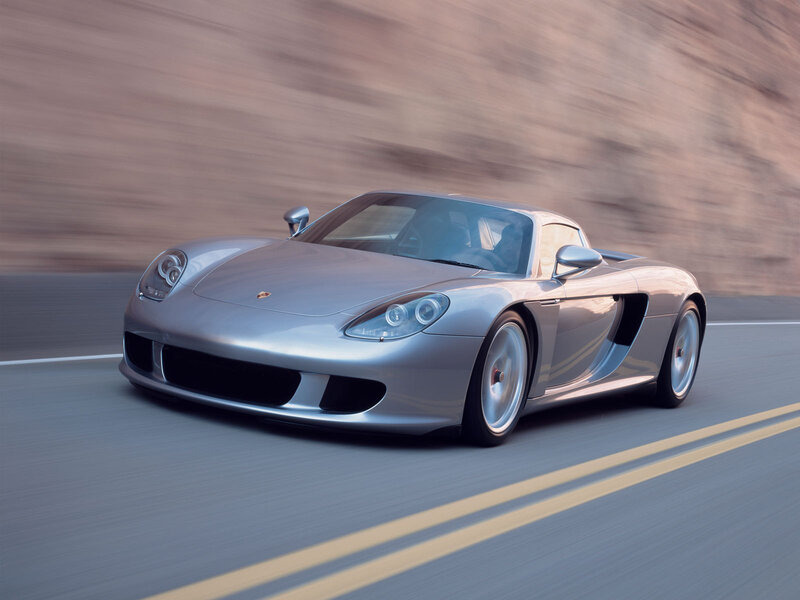 silver porsche cayman sports car