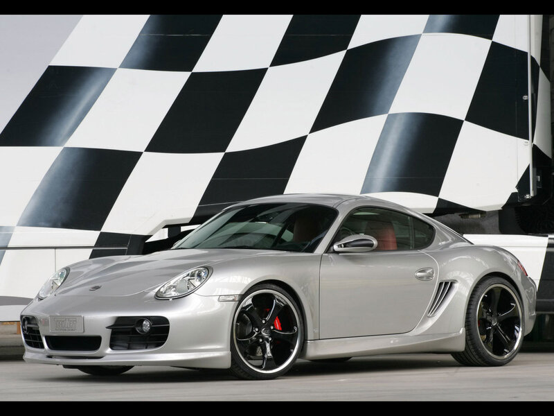 Silver Porsche Cayman with checkered flag