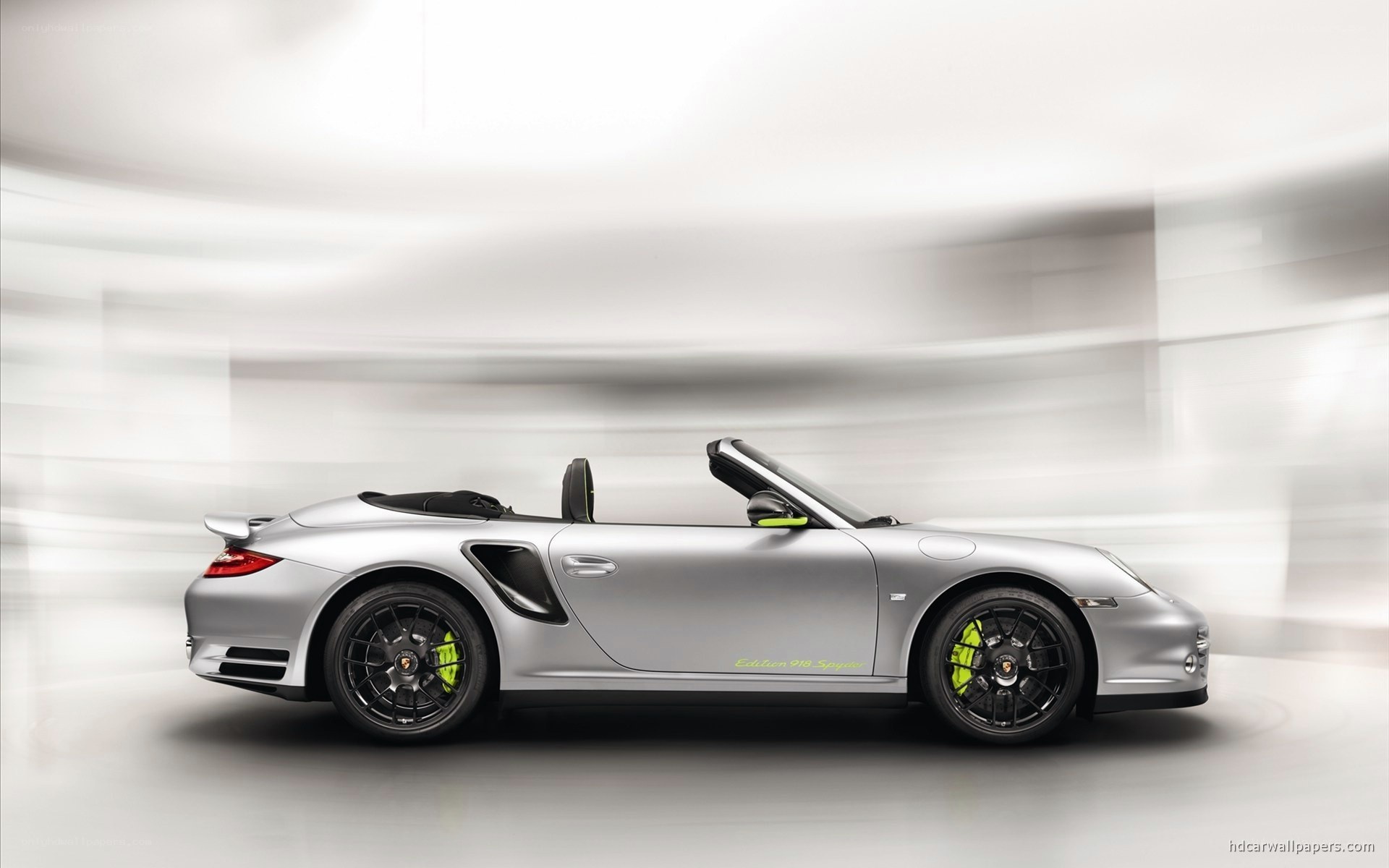 silver porsche convertible