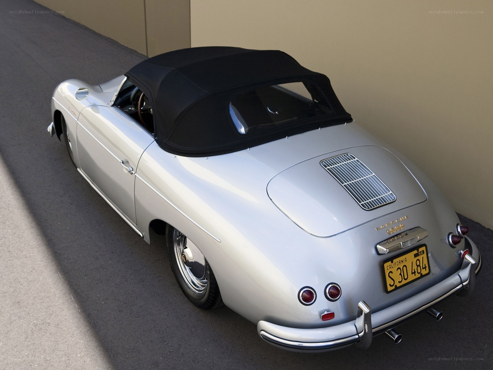 silver porsche convertible