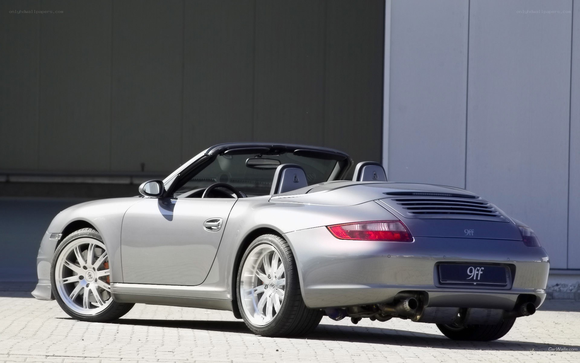 silver porsche convertible