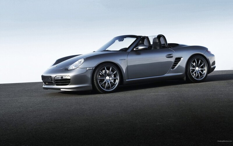 silver porsche convertible sports car
