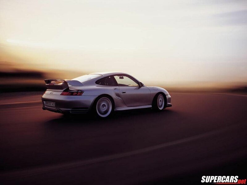 Silver Porsche GT2 on a track