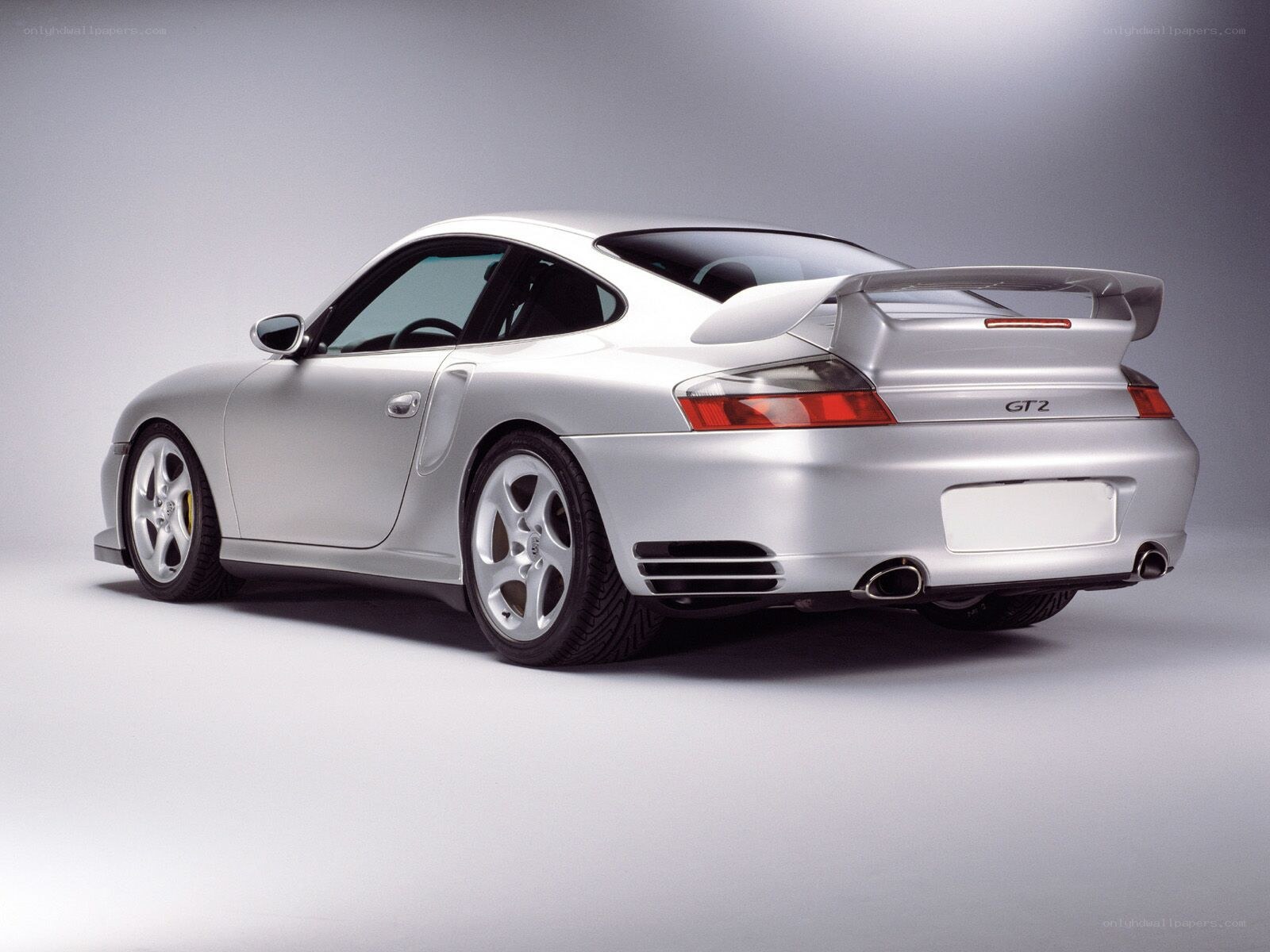 silver porsche gt2 rear view