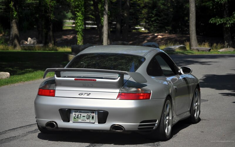 silver porsche gt2 rear view