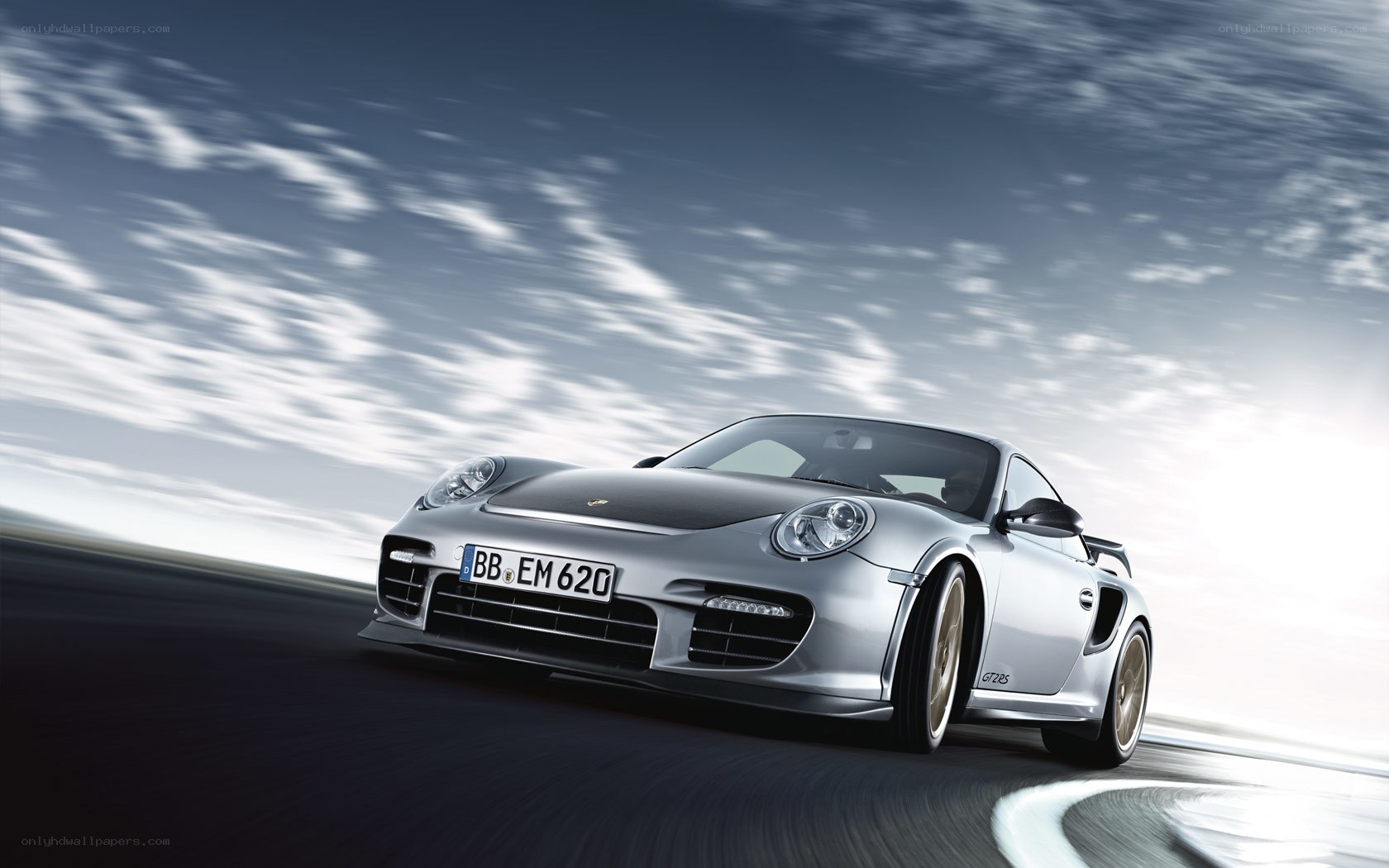 Silver Porsche GT2 RS in motion