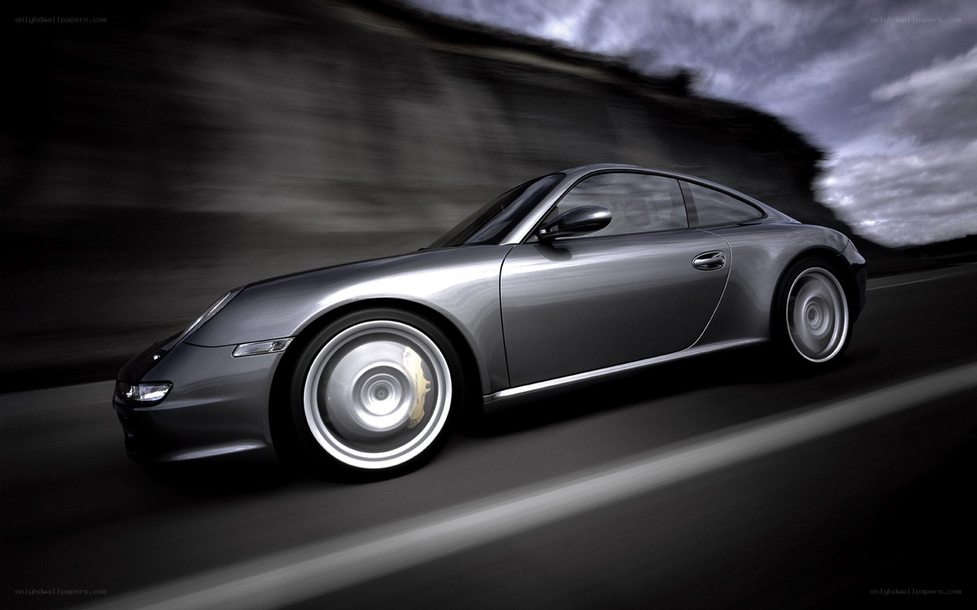 silver porsche in motion