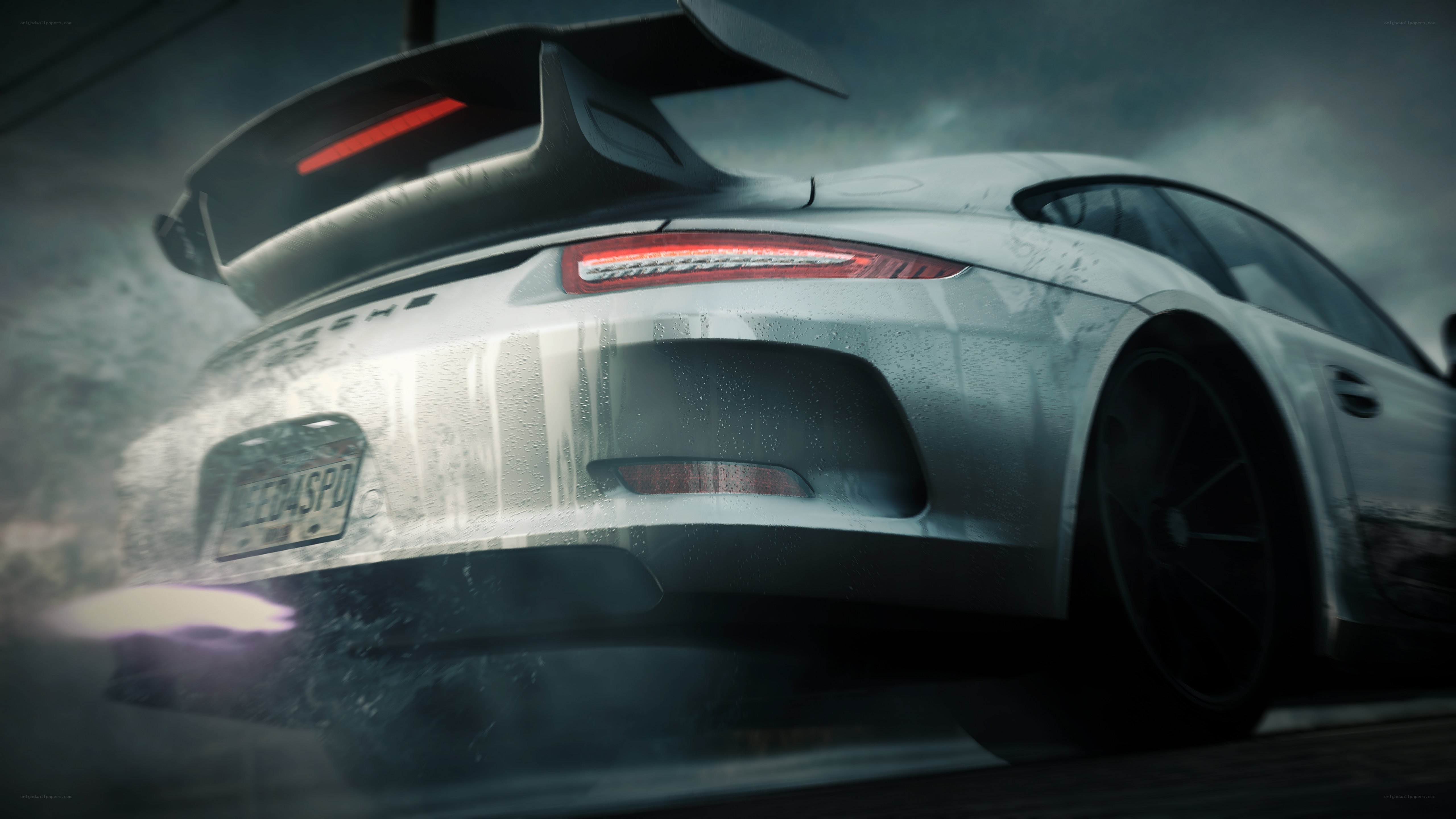 silver porsche in rain