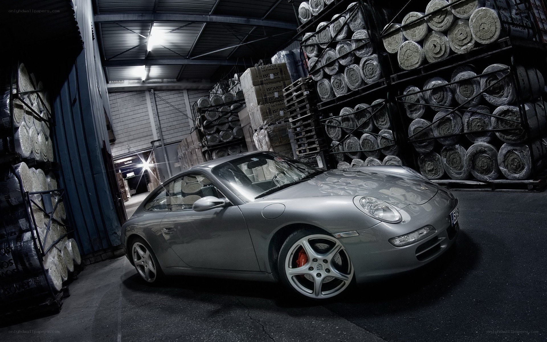 Silver Porsche in warehouse