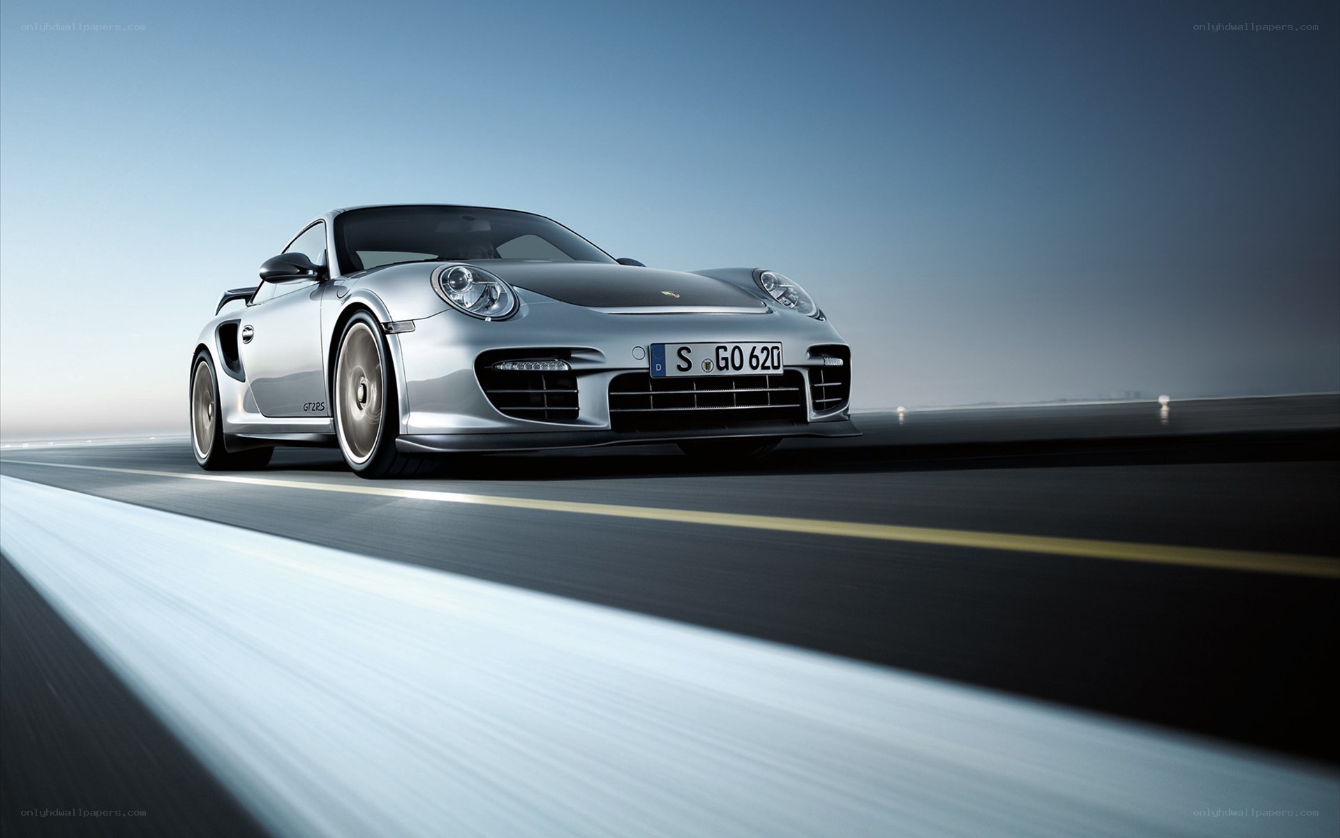 silver porsche on a road