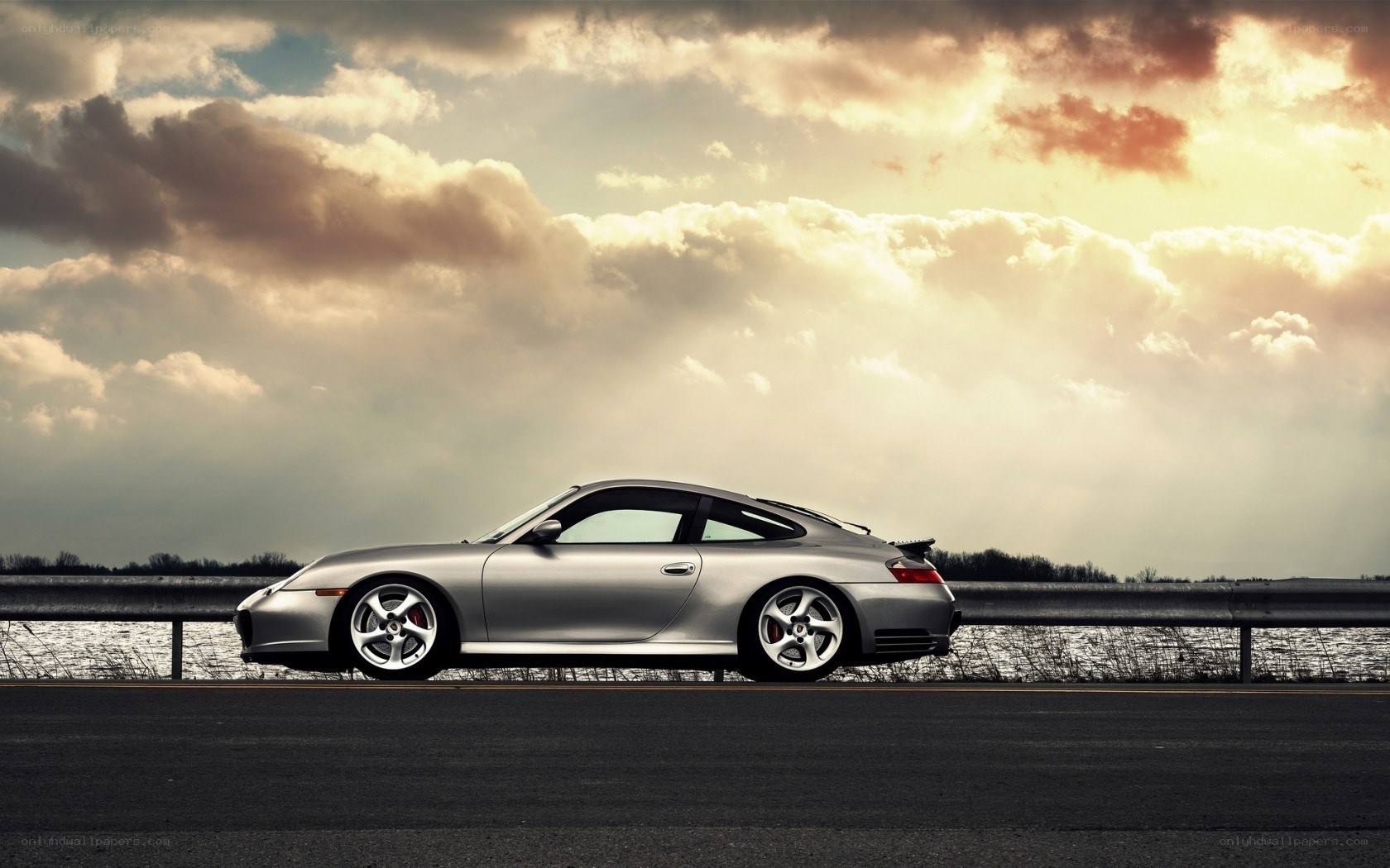 Silver Porsche on a road