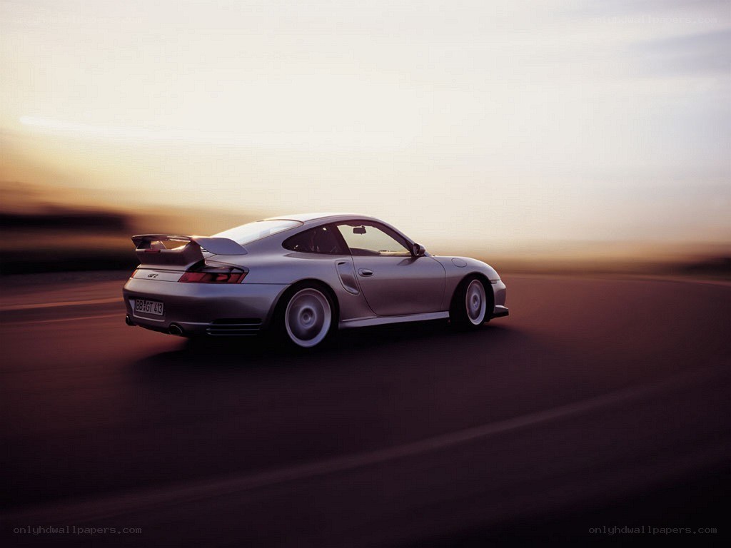 silver porsche on a road