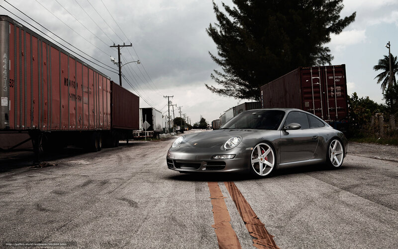silver porsche on a road