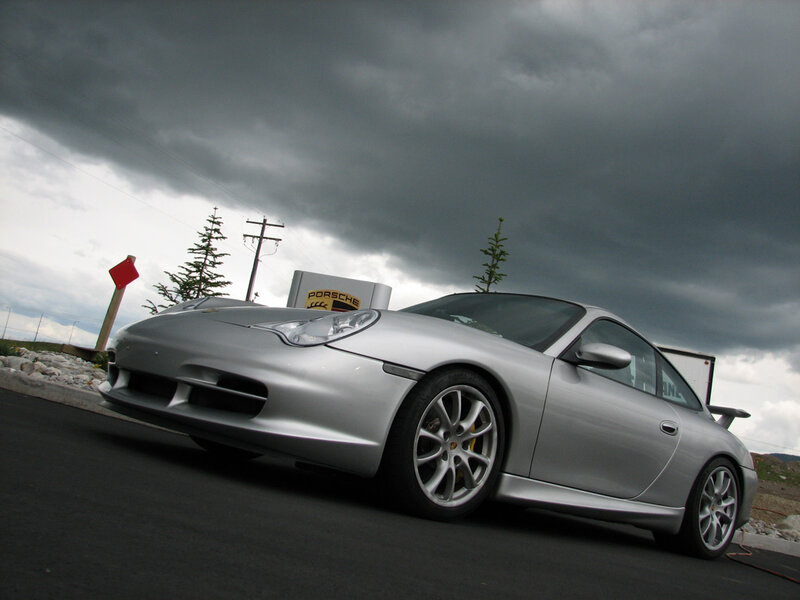 Silver Porsche on a stormy day