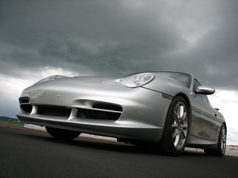 silver porsche on a track