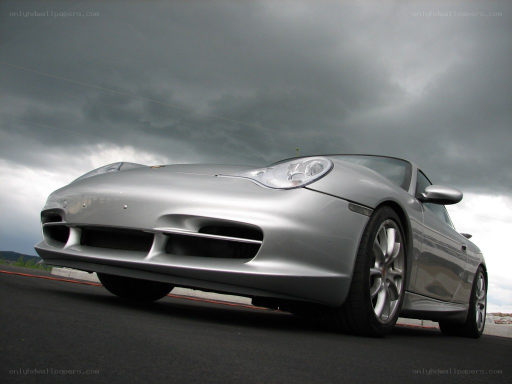 silver porsche on a track