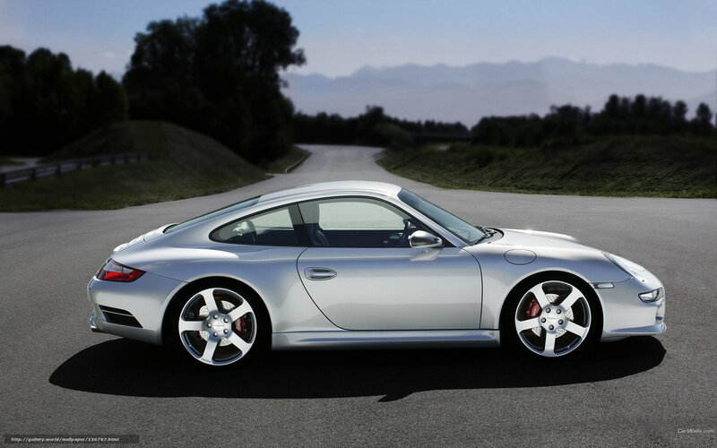 silver porsche on a winding road