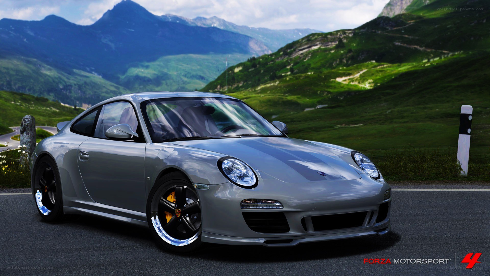 Silver Porsche on mountain road