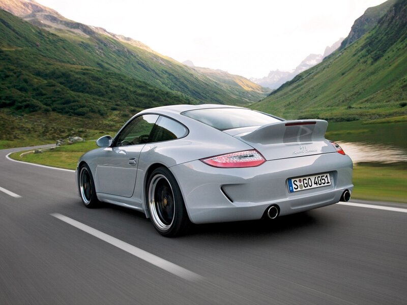 Silver Porsche on mountain road