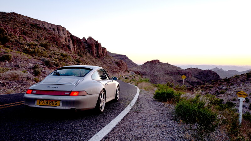 Silver Porsche on Mountain Road — Gray