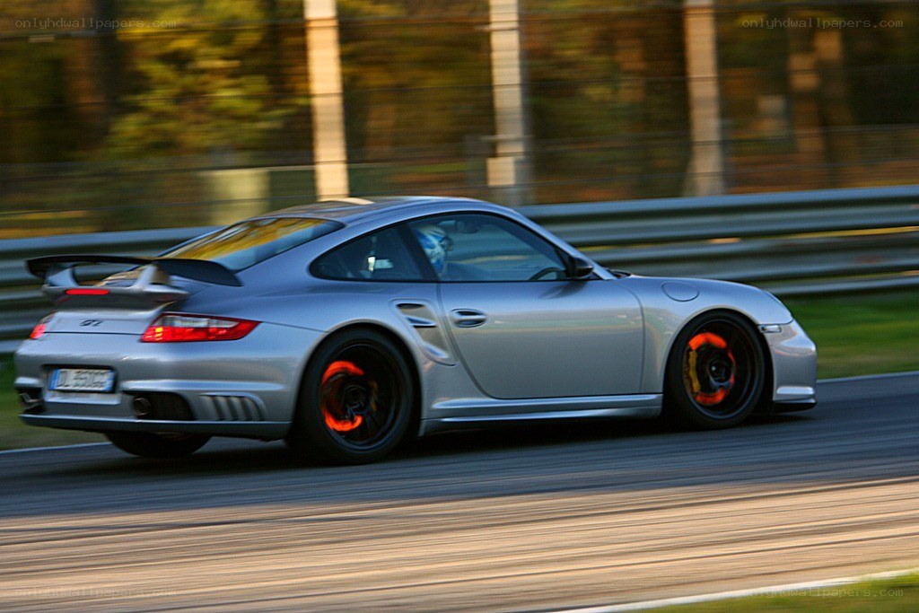 silver porsche on racetrack
