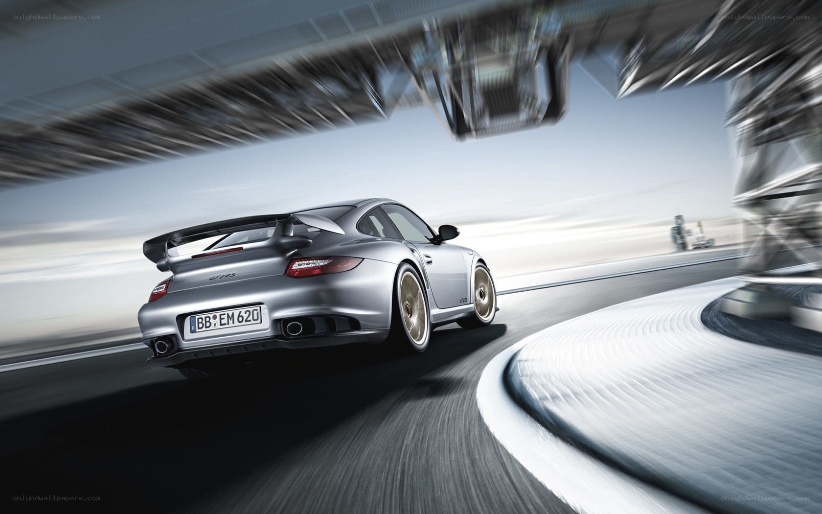 silver porsche on racetrack