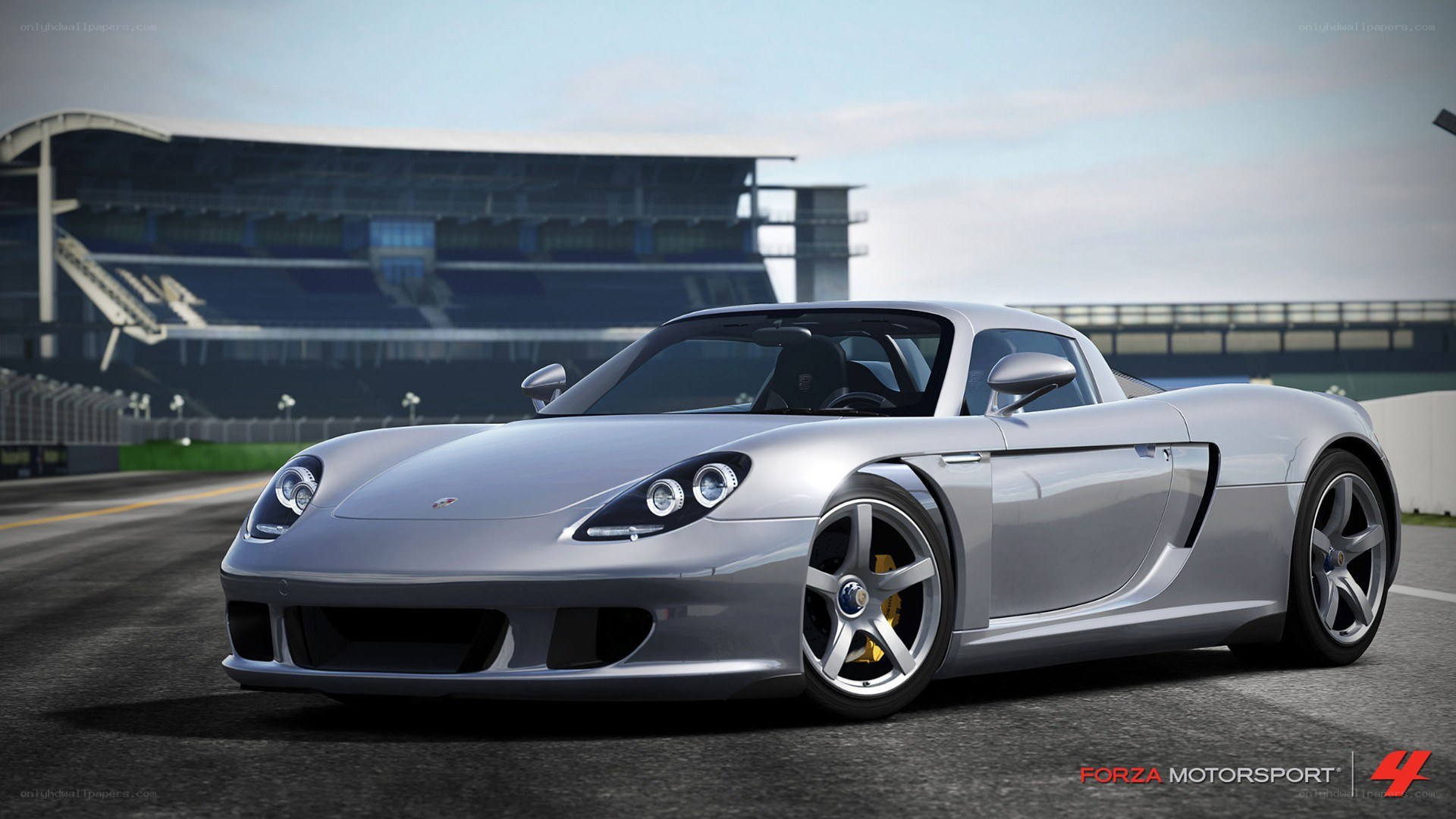 silver porsche on racetrack