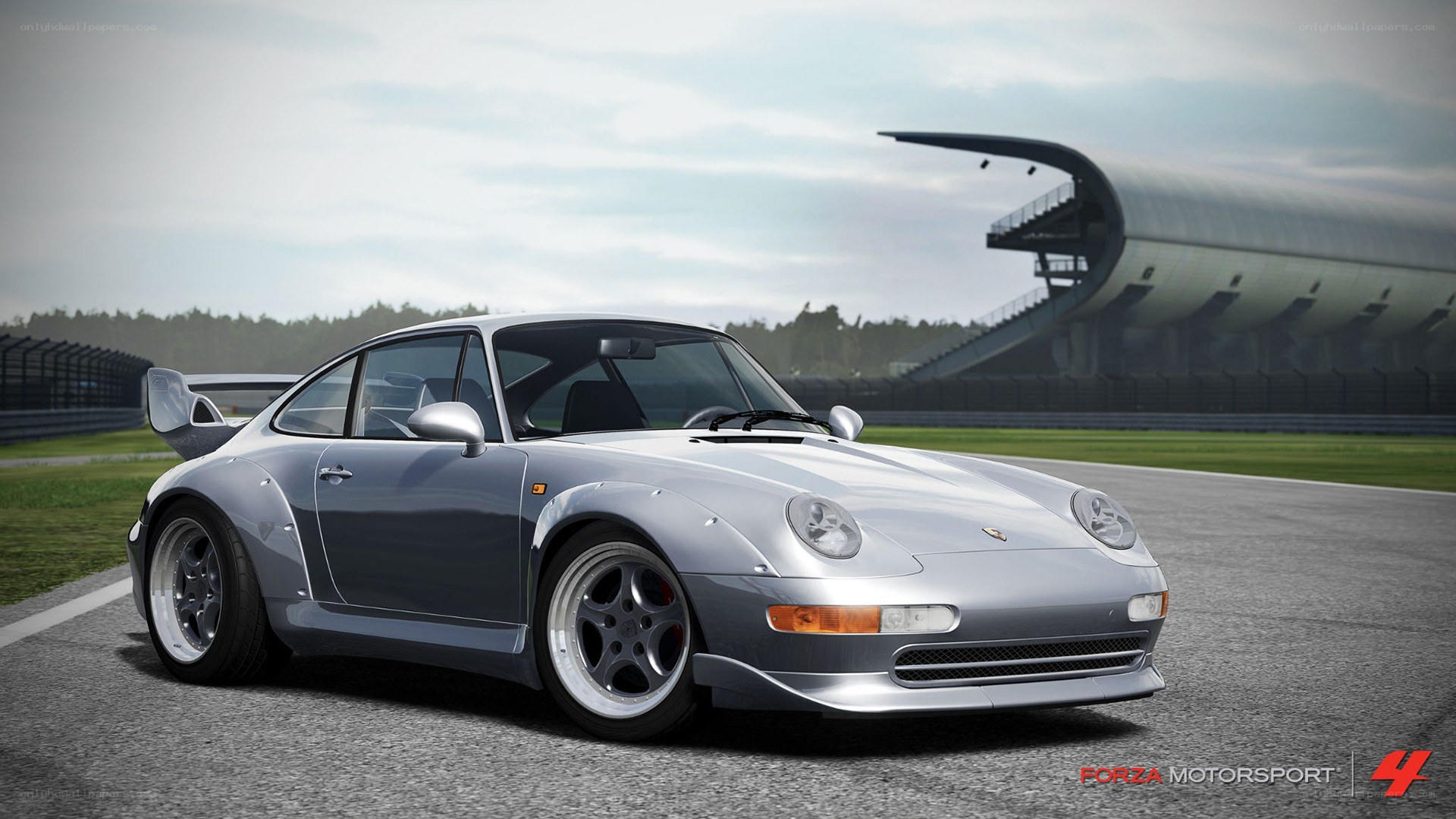 silver porsche on racetrack