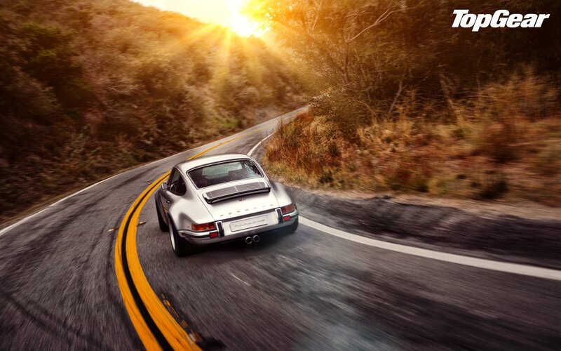 Silver Porsche on Road — Dramatic